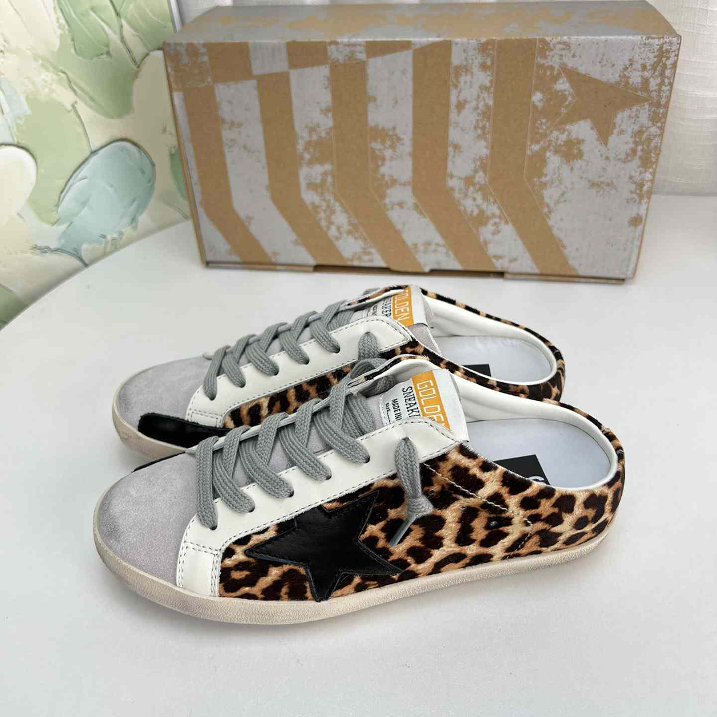 Golden Goose Super-Star Sabots In Leopard-Print Pony Skin With Black Leather Star And Ice-Gray Suede Tongue - DesignerGu