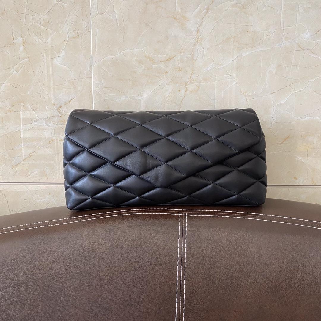 Saint Laurent Sade Puffer Quilted Leather Clutch In Black  - 