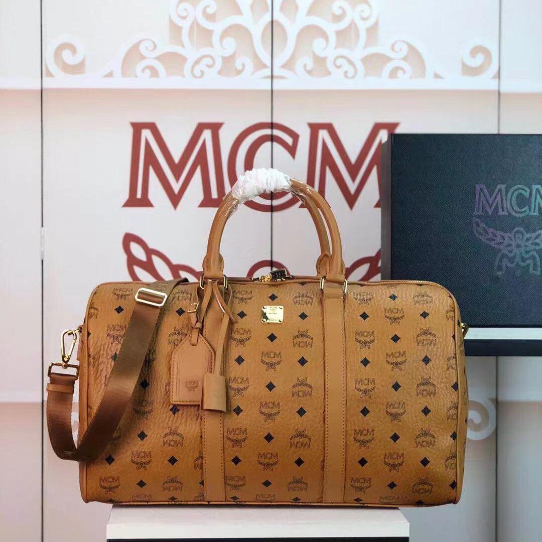 MCM Ottomar Weekender Bag in Visetos - DesignerGu