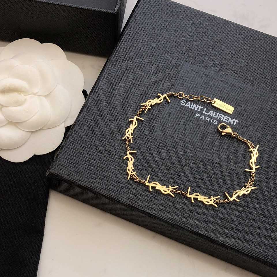 Saint Laurent Cassandre Multi-charm Bracelet In Metal - 
