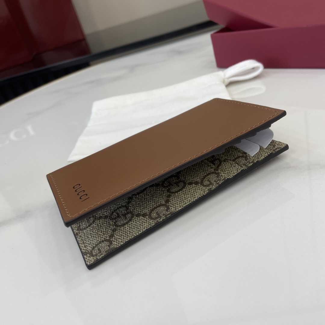 Gucci GG Emblem Bi-fold Embossed Card Case - 