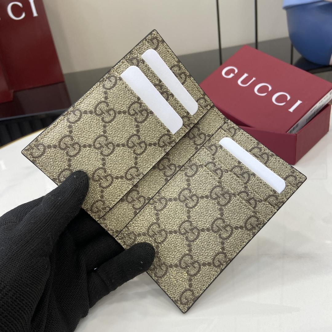 Gucci GG Emblem Bi-fold Embossed Card Case - 
